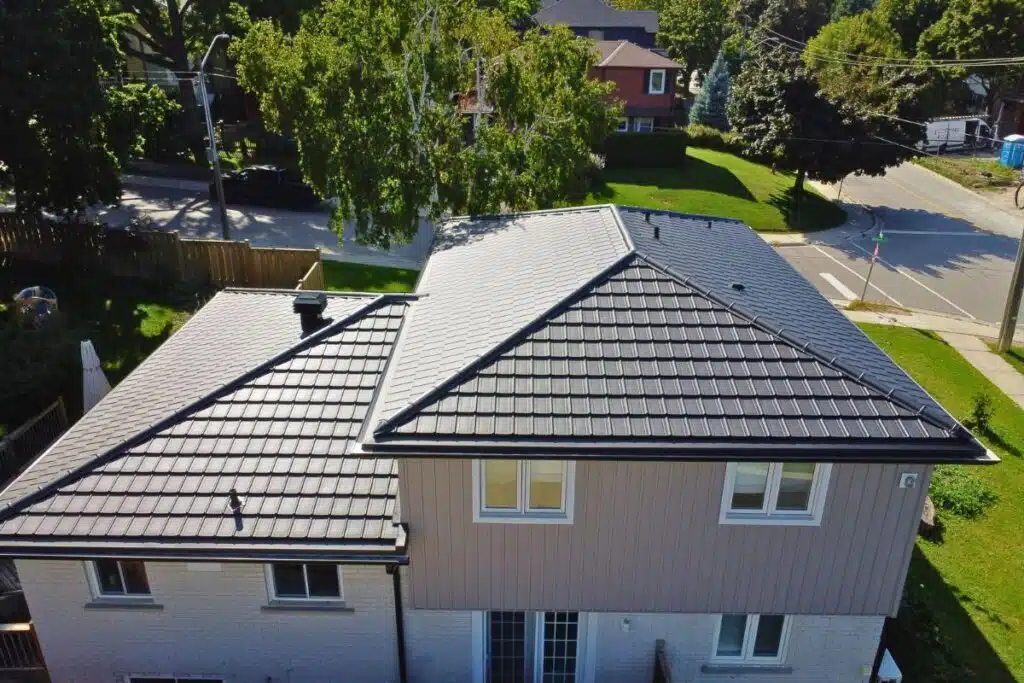 Frigge metal roof installed on a suburban home.