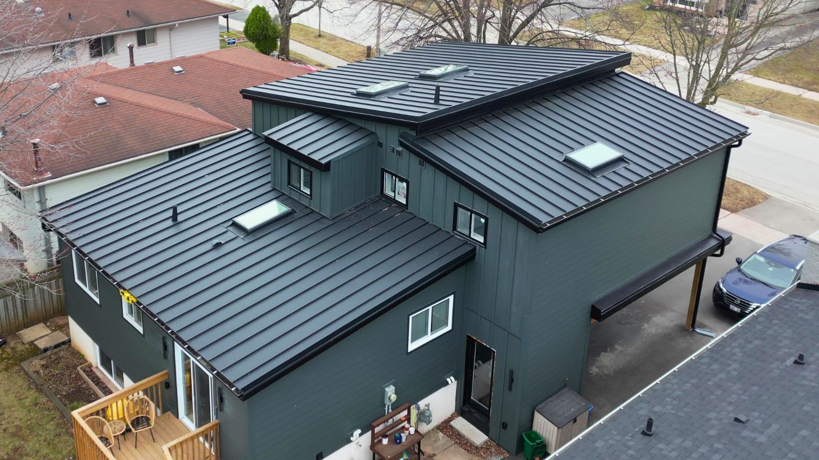 Textured Black Matt standing seam metal roof on a modern residential home in Oakville