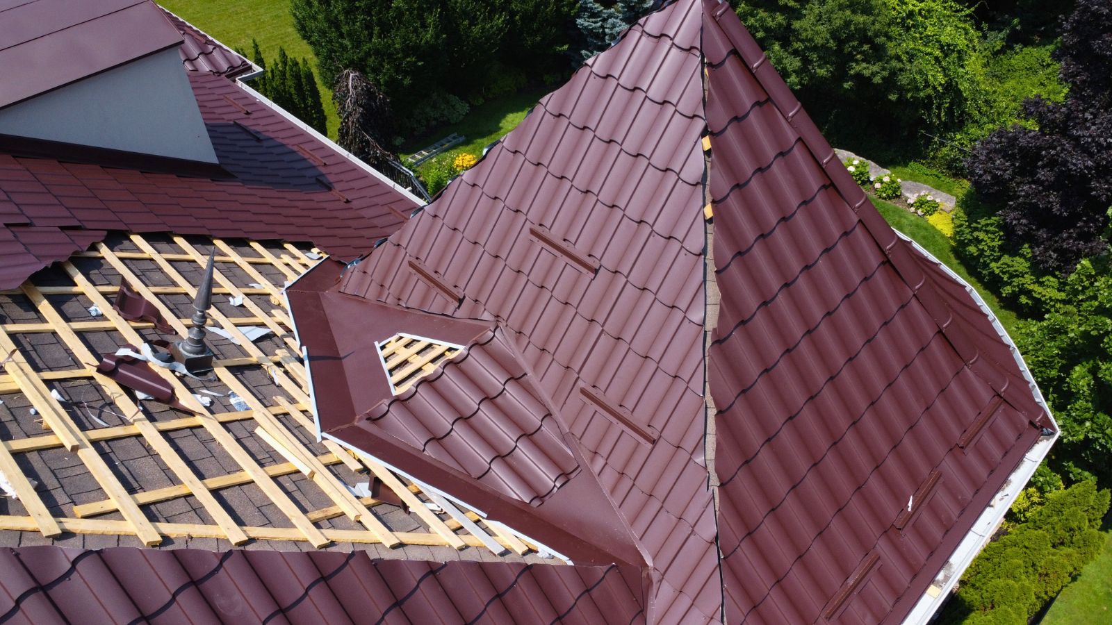 Ruukki Monterrey metal tile roof with valley, turret section, and custom flashing detail